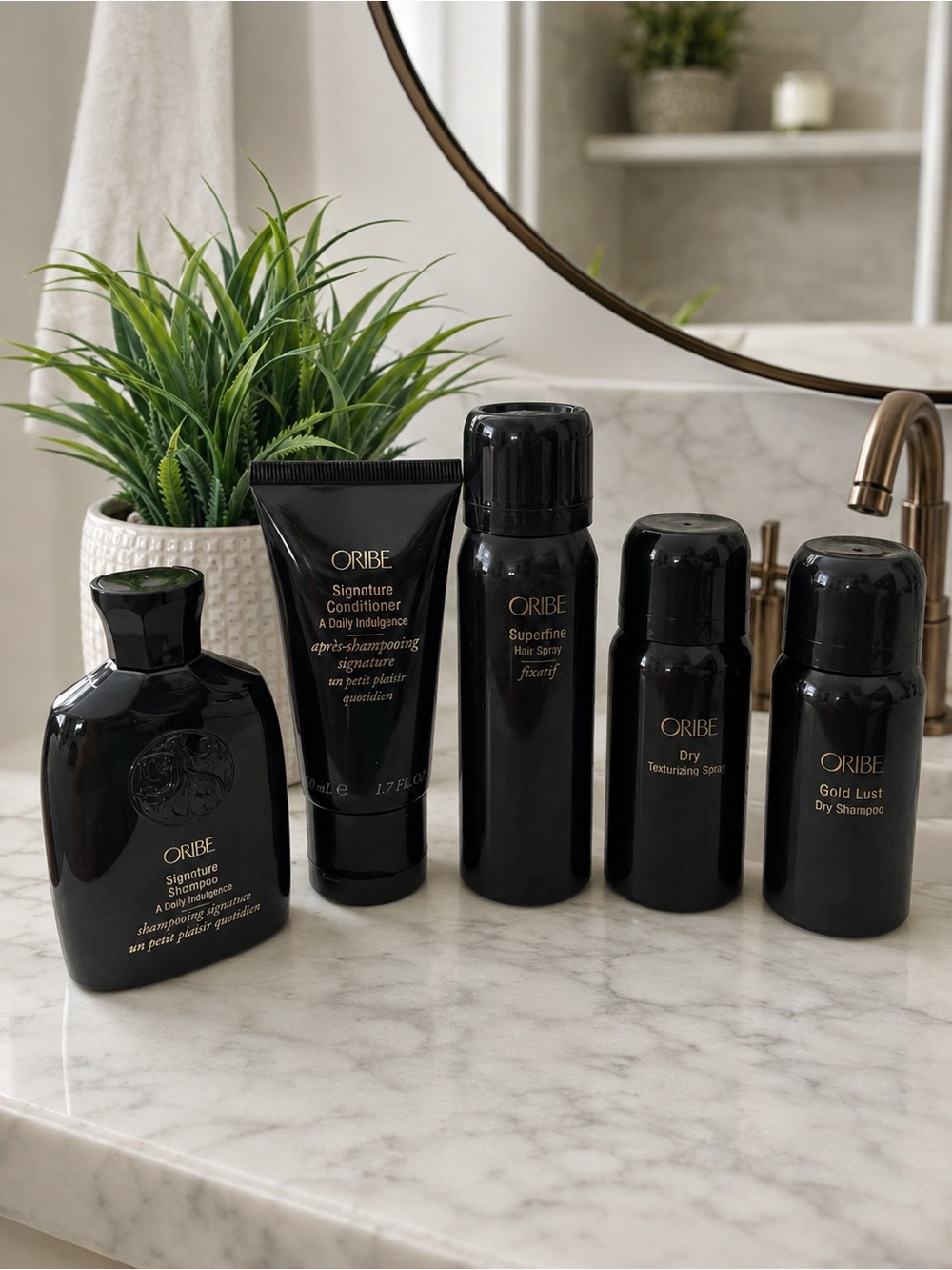 Oribe Signature Hair Care Travel Set | Shampoo Conditioner & Styling Minis